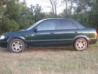 B497OM 190 RUS, Mazda 323